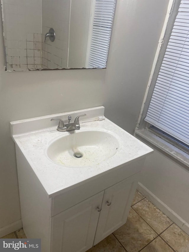 bathroom featuring vanity and tile patterned floors