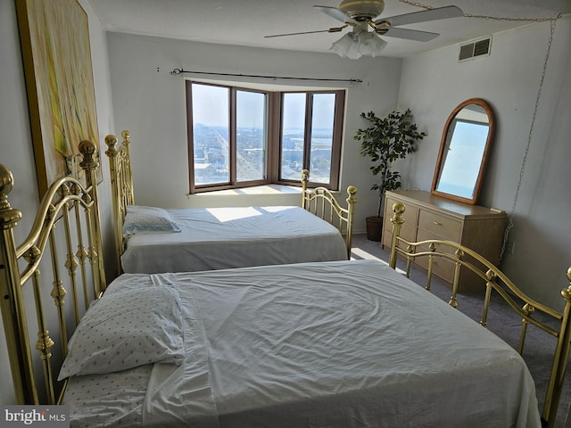 bedroom with carpet flooring and ceiling fan