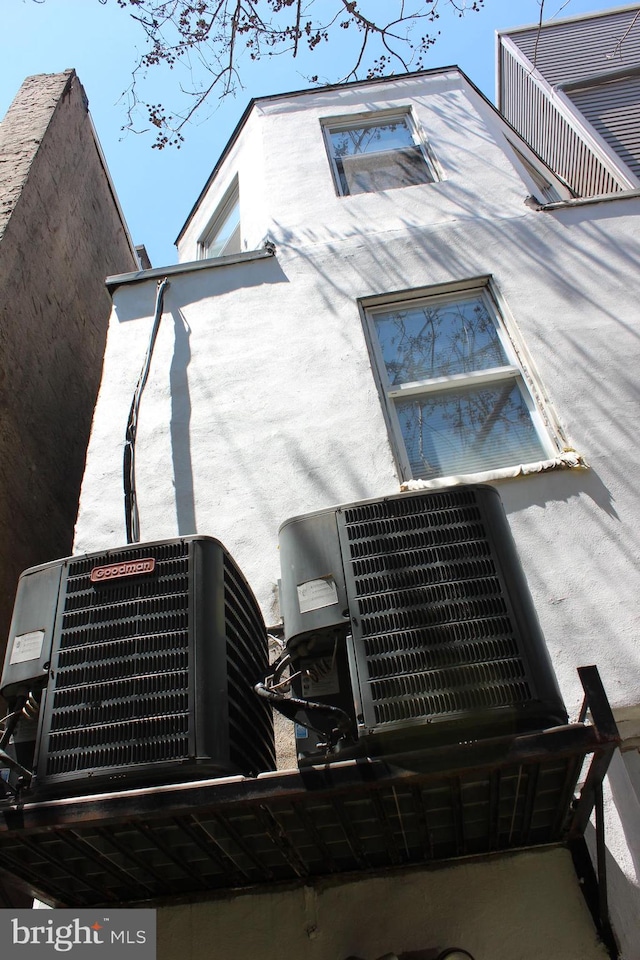 exterior space featuring cooling unit