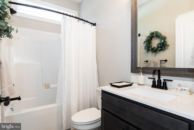 full bathroom featuring vanity, toilet, and shower / bath combo