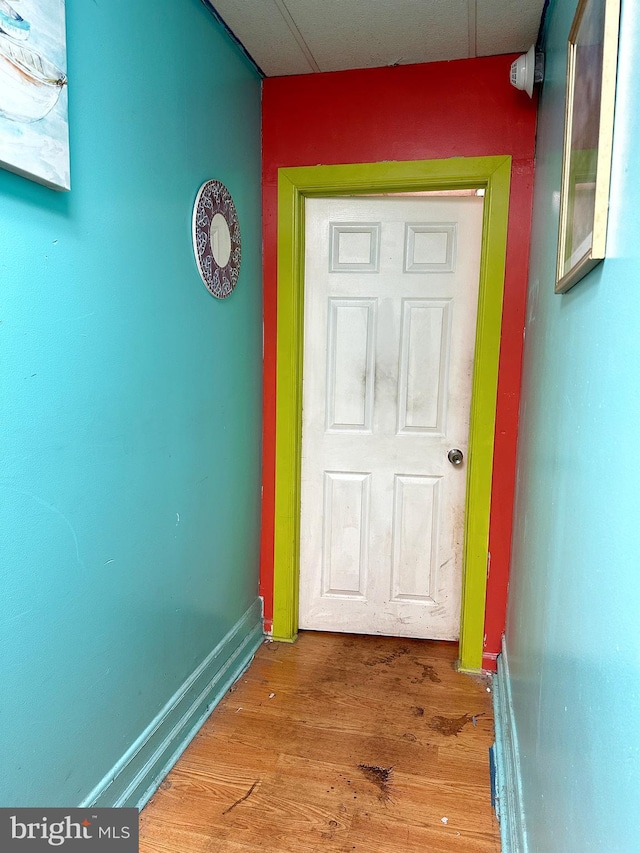 entryway with hardwood / wood-style floors