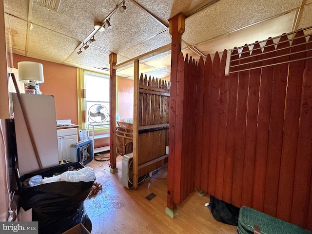 miscellaneous room with light hardwood / wood-style floors