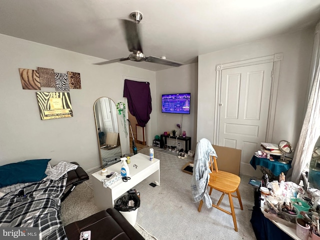 carpeted bedroom featuring ceiling fan