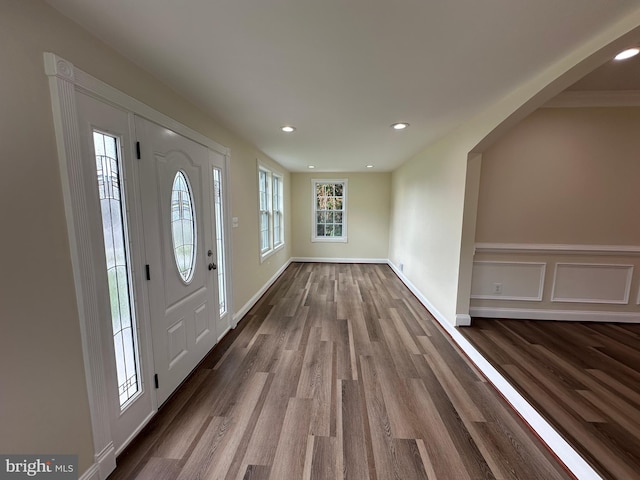 foyer with wood-type flooring