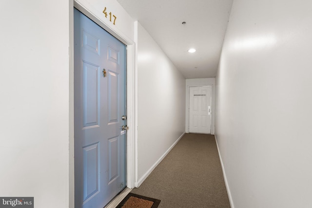 corridor featuring carpet