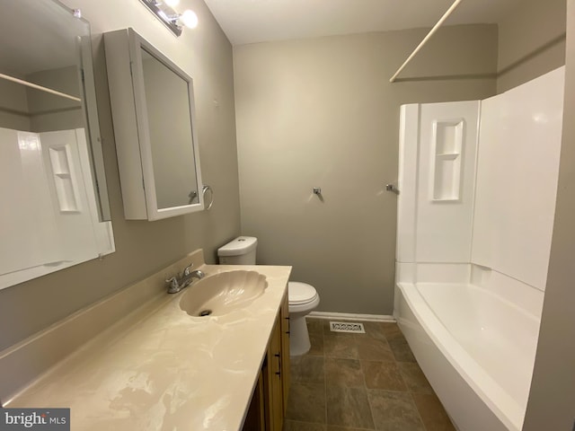 full bathroom with vanity,  shower combination, and toilet