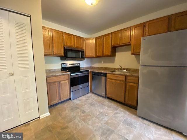 kitchen with sink and stainless steel appliances