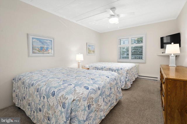 carpeted bedroom with a baseboard radiator and ceiling fan