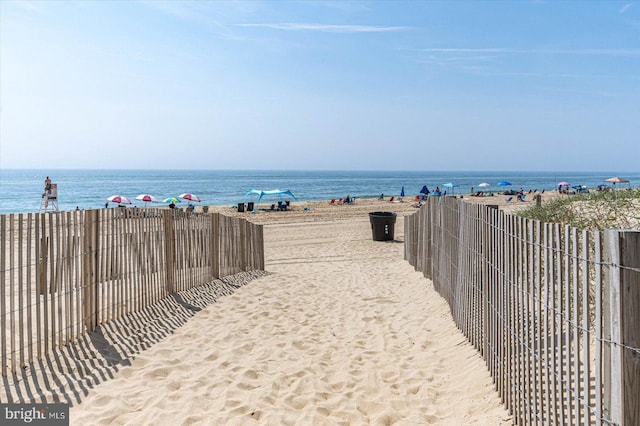 property view of water with a beach view