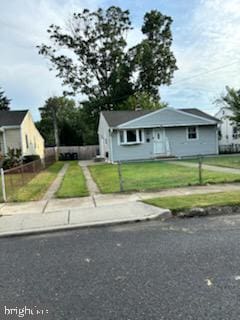 view of front of property with a front yard