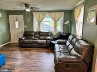 living room with hardwood / wood-style floors and ceiling fan