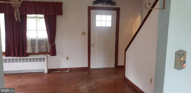 entrance foyer featuring radiator