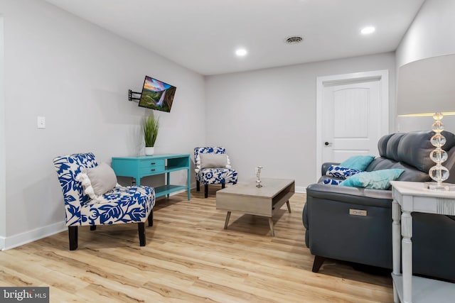 living area featuring light hardwood / wood-style floors