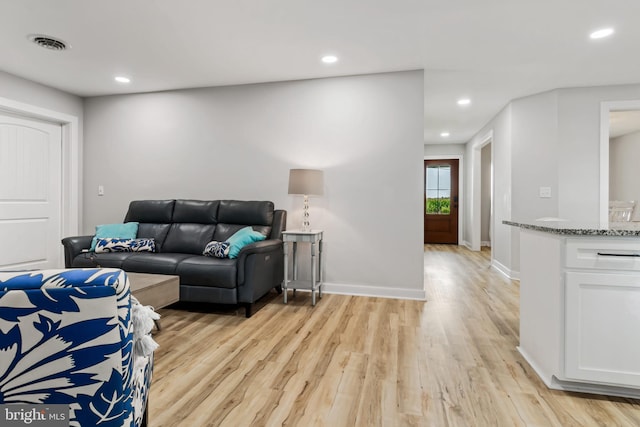 living room featuring light wood-type flooring