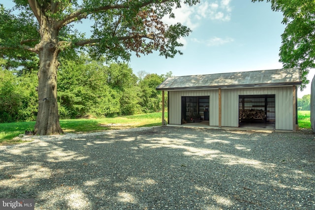 exterior space with an outbuilding