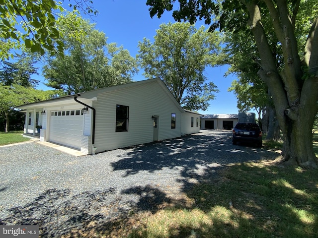 view of property exterior with a garage