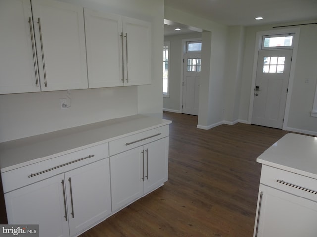 entrance foyer featuring recessed lighting, dark wood-style flooring, and baseboards