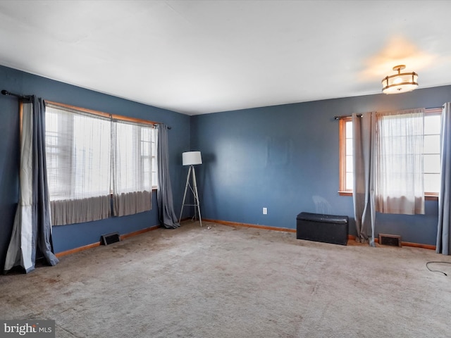 spare room with carpet flooring