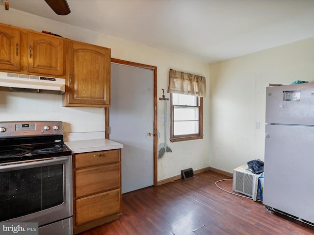 kitchen with stainless steel electric stove, ceiling fan, white refrigerator, and dark hardwood / wood-style flooring