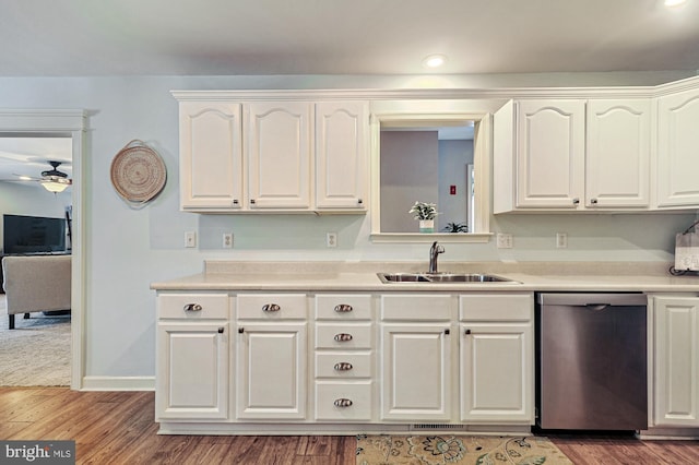 kitchen with white cabinets, ceiling fan, dark wood-type flooring, sink, and dishwasher