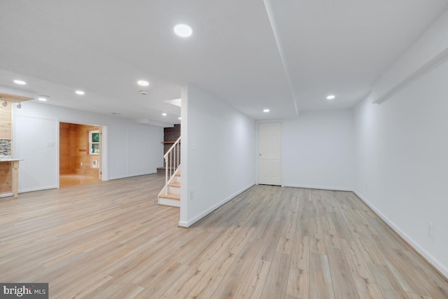 basement featuring light hardwood / wood-style flooring