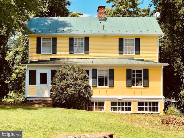 view of front of house with a front yard