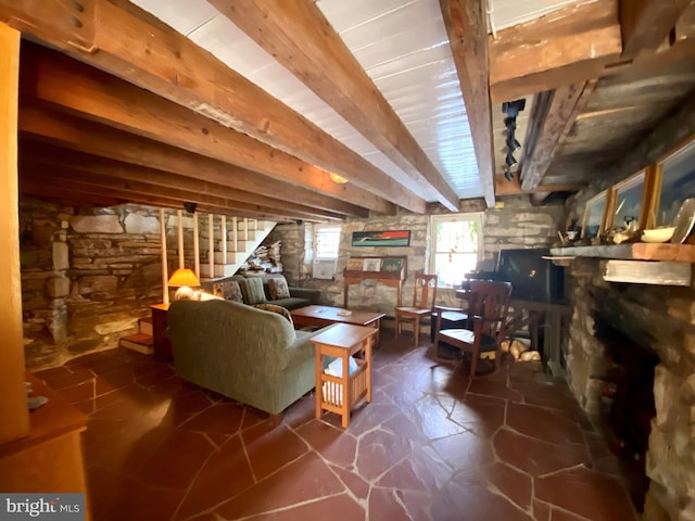 sitting room with beam ceiling