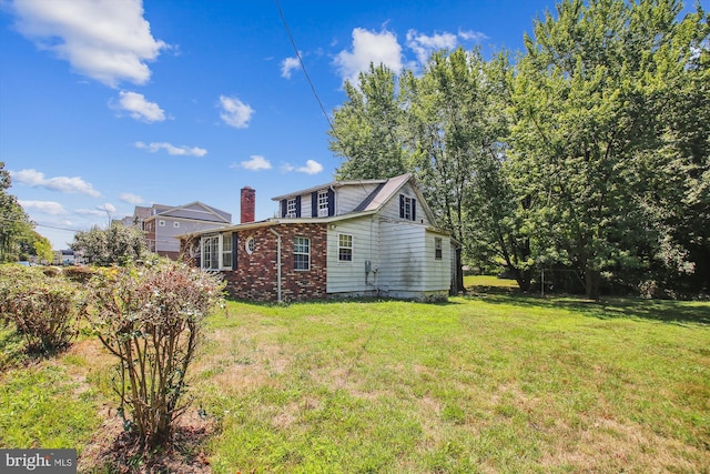 exterior space featuring a yard