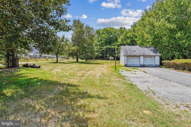 view of yard with a garage