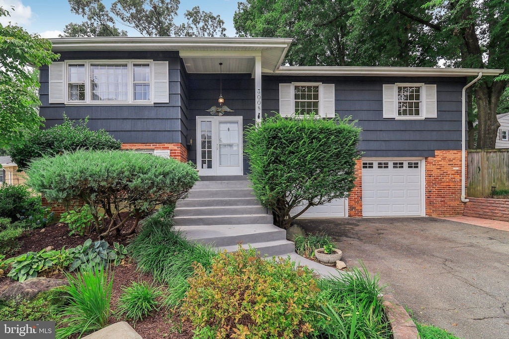 view of front of property with a garage