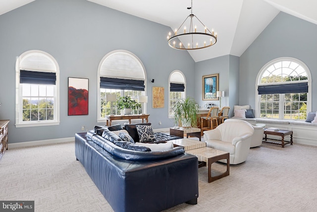 bedroom featuring light carpet, high vaulted ceiling, and a notable chandelier