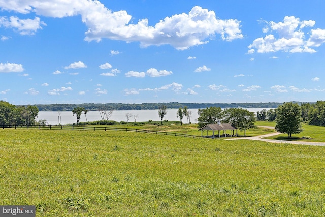 water view with a gazebo and a rural view