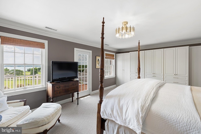 bedroom with light colored carpet, an inviting chandelier, and ornamental molding