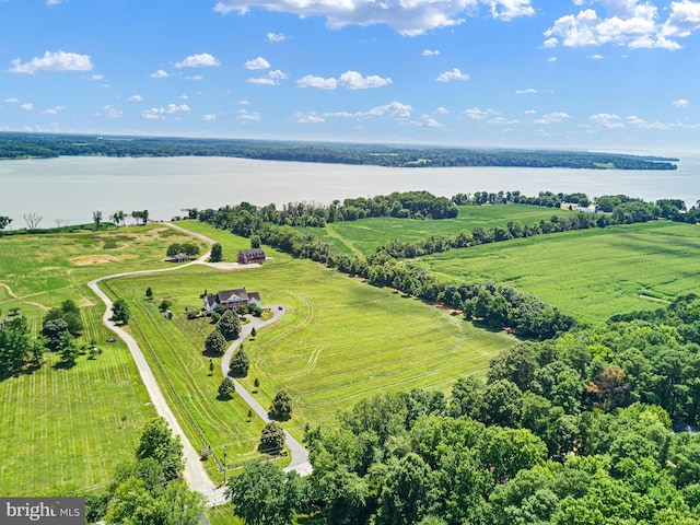 drone / aerial view featuring a rural view and a water view