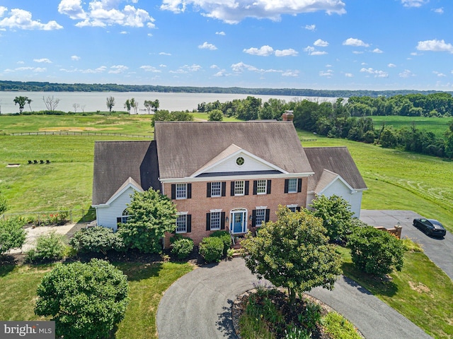 drone / aerial view with a water view