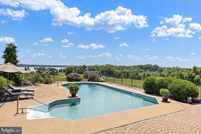 view of pool featuring a patio