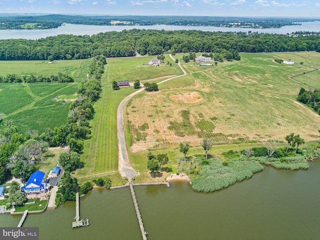 drone / aerial view featuring a water view and a rural view