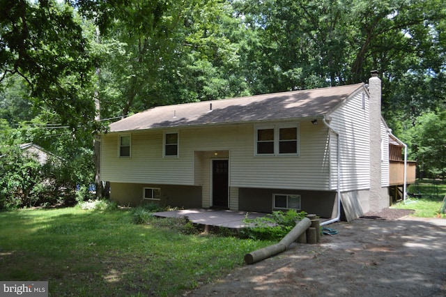 back of property featuring a patio area