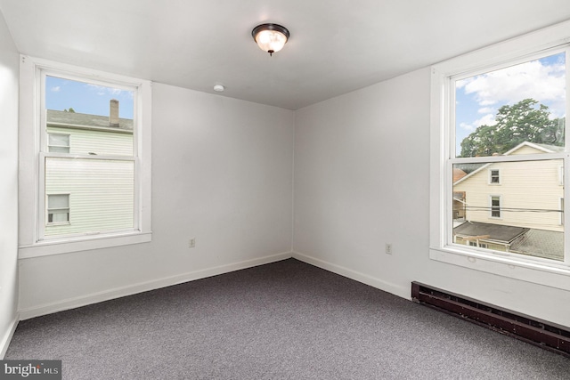 28 N 4th St, Steelton, PA 17113 - carpeted spare room featuring baseboard heating