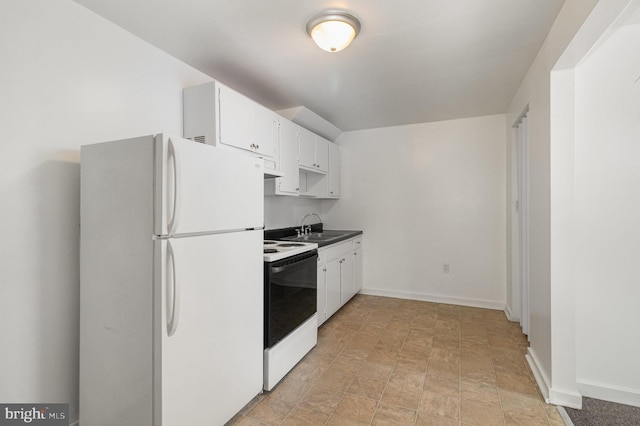 28 N 4th St, Steelton, PA 17113 - kitchen featuring electric stove, white cabinets, white refrigerator, and sink
