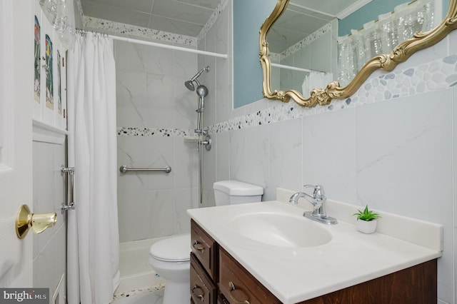 full bathroom with toilet, tile walls, a tile shower, and vanity
