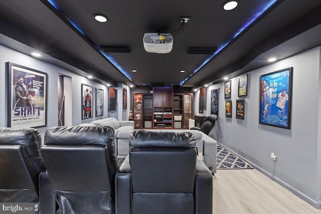 home theater room featuring wood-type flooring