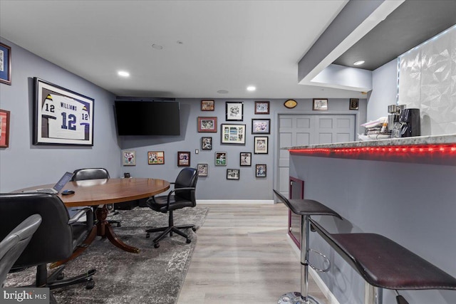 home office featuring light hardwood / wood-style floors