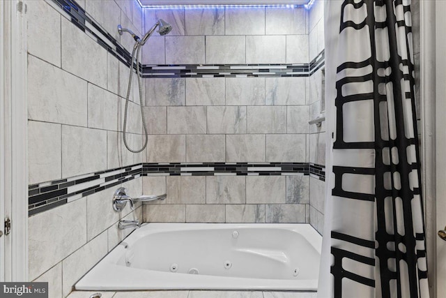 bathroom with shower / bathtub combination with curtain