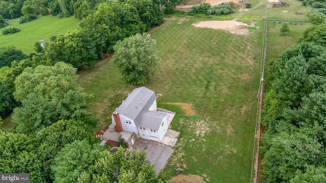 birds eye view of property featuring a rural view