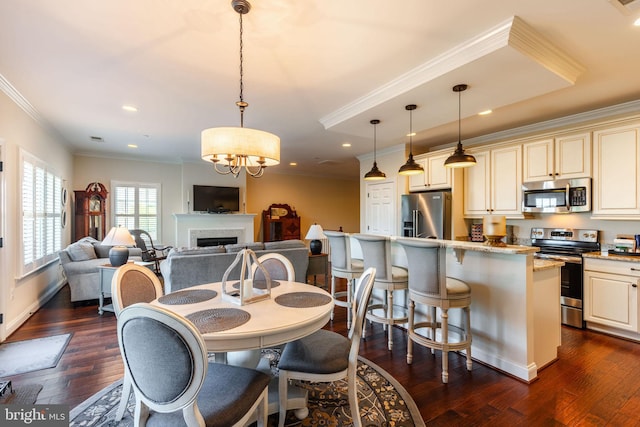 dining area with crown molding, a chandelier, and dark hardwood / wood-style floors