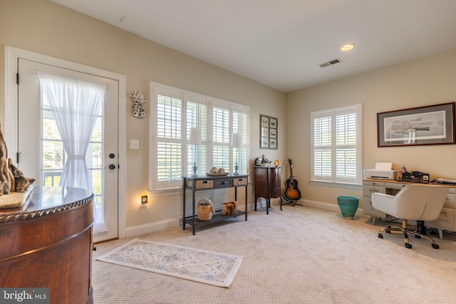 office area with light colored carpet