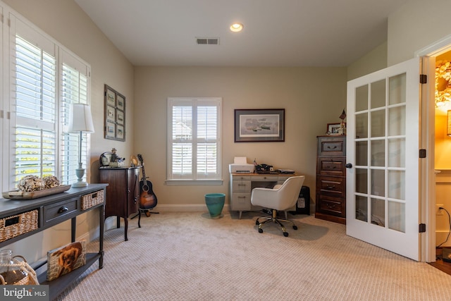 home office with light carpet