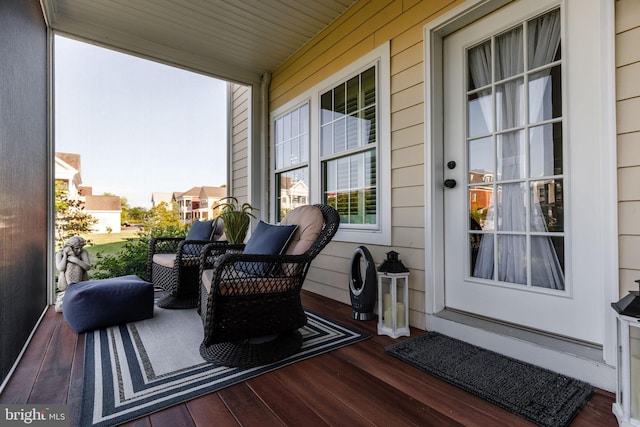 balcony featuring a porch