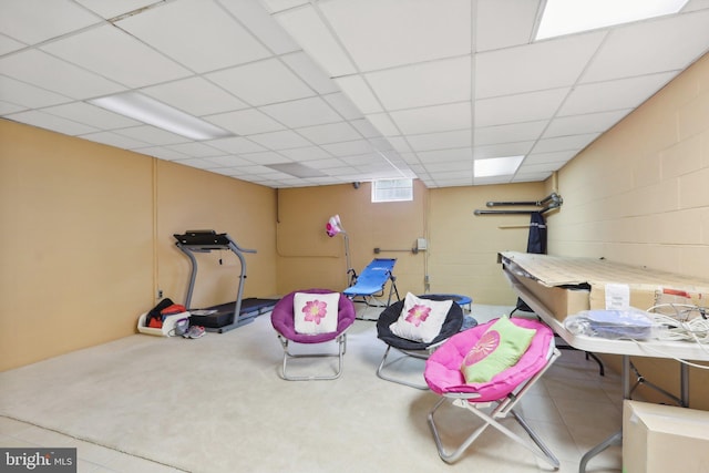 interior space featuring a paneled ceiling